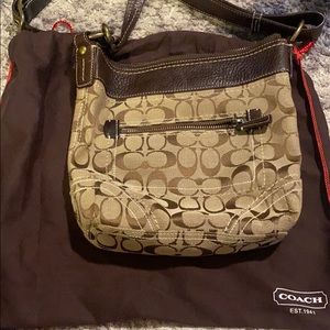 AUTHENTIC coach cross body bag includes dust bag